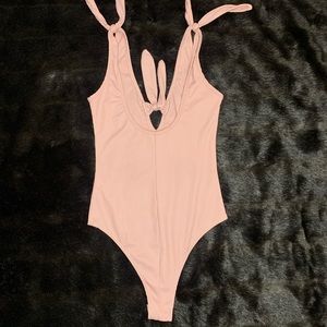 Pink bodysuit